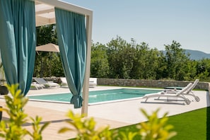 Outdoor pool, a heated pool - Brand new top villa *****, with heated pool, only 2 km from the sea (Rakalj)