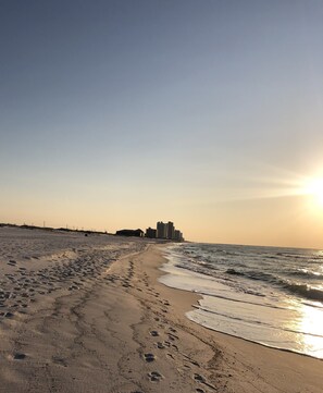 On the beach, sun-loungers, beach towels