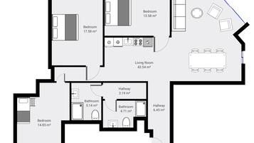 A floor plan of a hotel with multiple bedrooms, bathrooms, a living room, and a dining area.