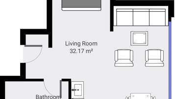 Un plan d’étage comprenant un salon de 32,17 m² et une salle de bain de 5,43 m².