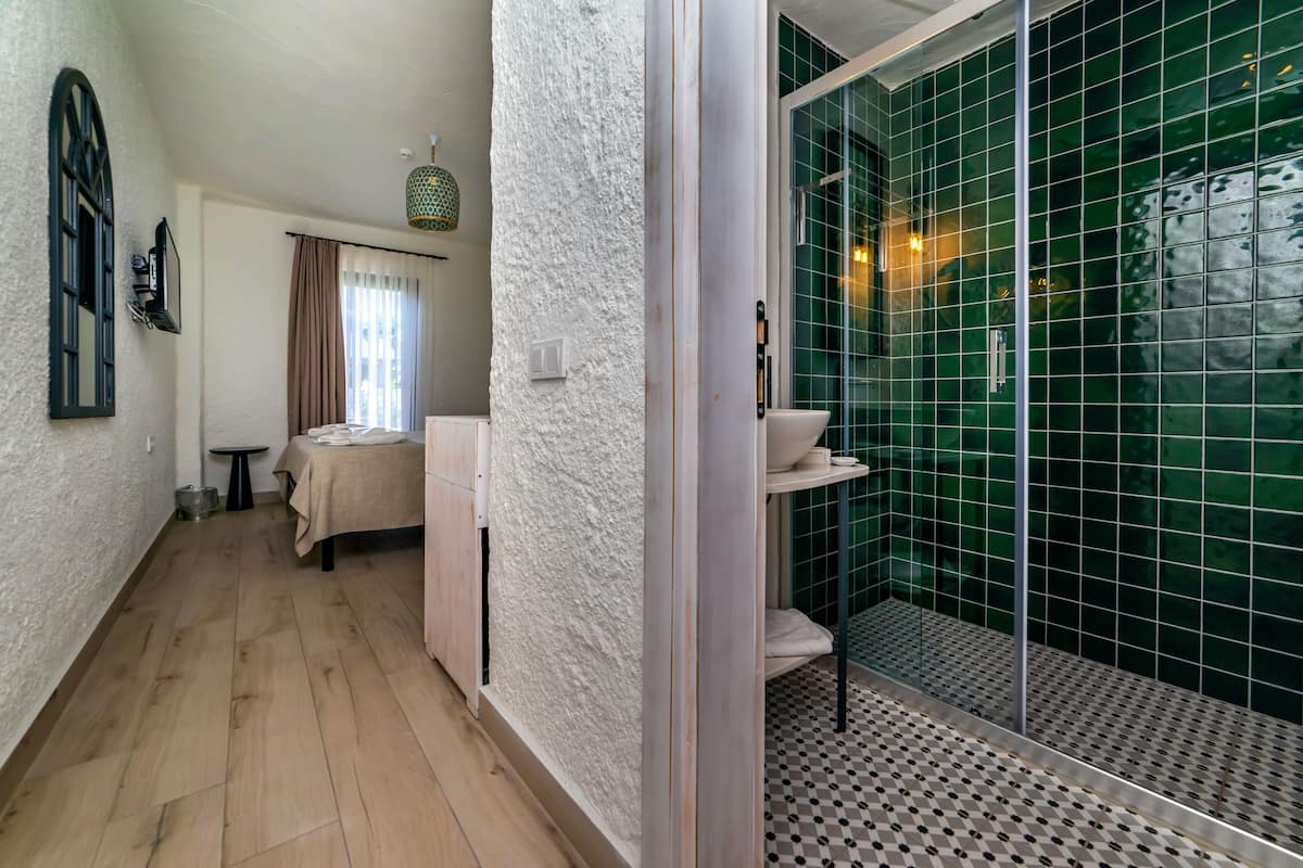 standard pool view | premium bedding, minibar, in-room safe, iron/ironing board