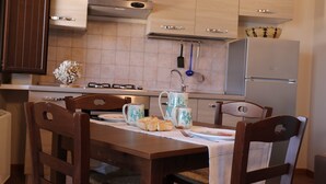 Executive Apartment | Living area - B Holidays Casa Vacanze (Cabras)