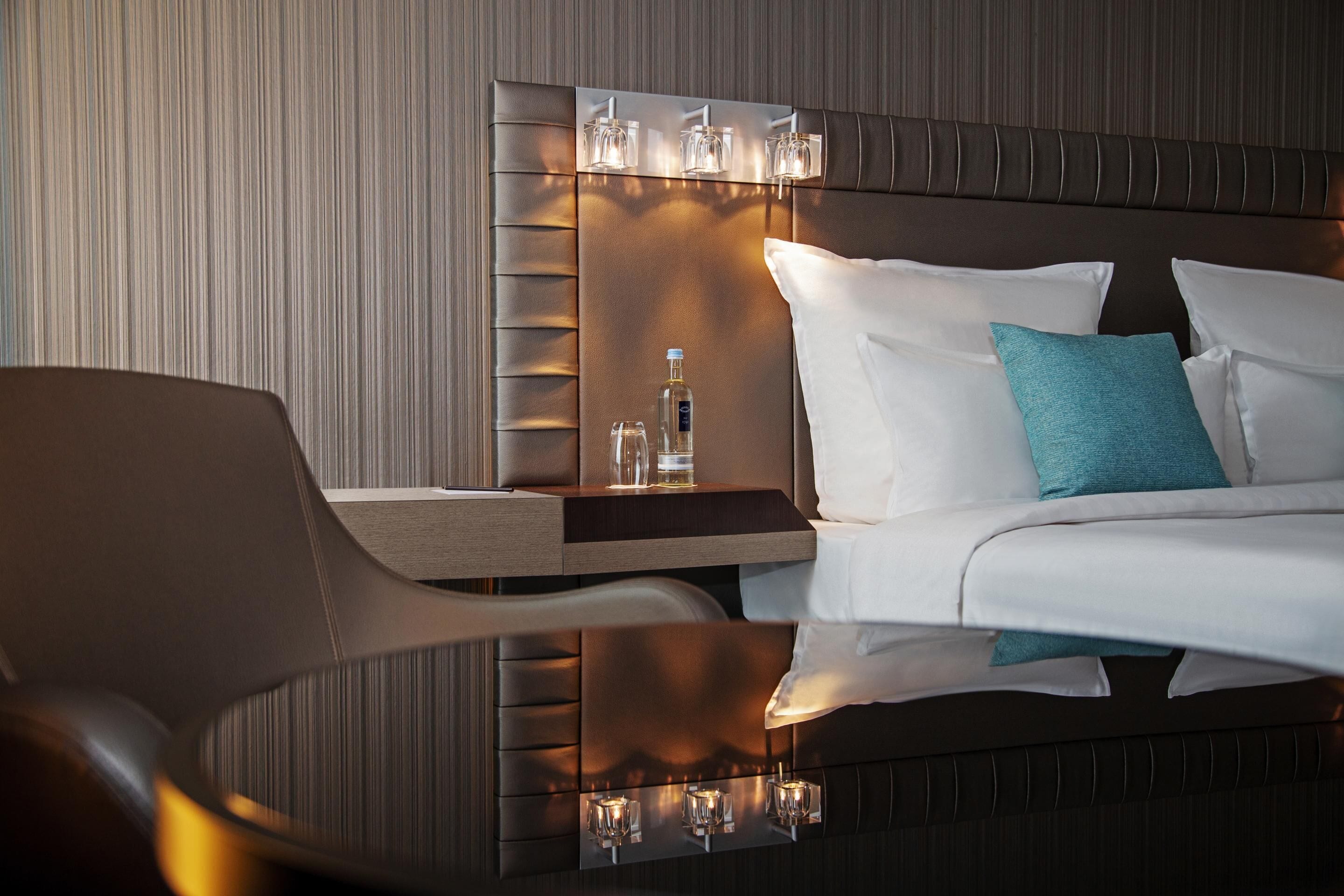 hypo-allergenic bedding, down duvets, minibar, in-room safe