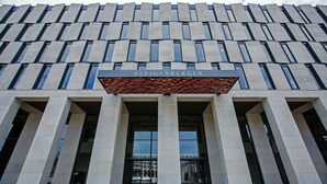 A modern building with a grid-like facade and a prominent entrance. - Steigenberger Airport Hotel Berlin (Schoenefeld)