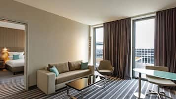 Hypo-allergenic bedding, down comforters, minibar, in-room safe