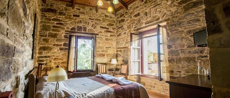 Twin Room | 1 bedroom, in-room safe, individually decorated, desk