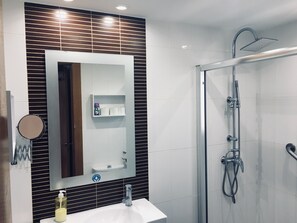 Shower, hair dryer, towels, soap
