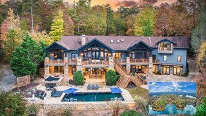 Ein großes, mehrstöckiges Haus mit Pool, Sitzgelegenheiten im Freien und einem schönen Blick auf einen See und Wald.