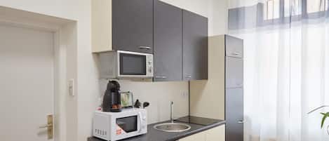 Apartment | Eigene Küche | Kühlschrank, Mikrowelle, Herdplatte, Geschirrspüler