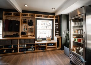 A storage room with shelves for shoes, hats, and other items. - LOGE Leavenworth (Leavenworth)