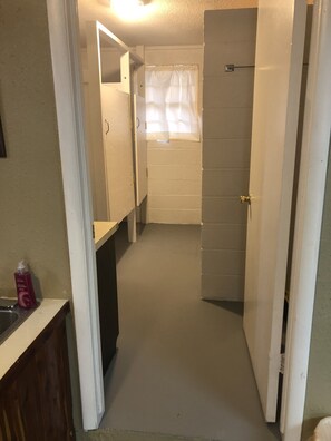 Shower, towels, toilet paper