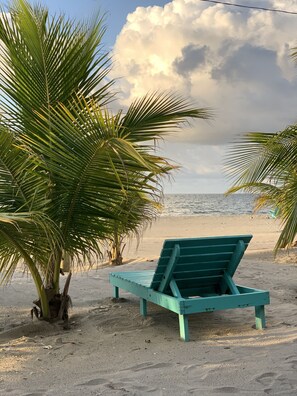 Private beach, white sand, sun loungers, beach volleyball