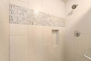 Combined shower/tub, hair dryer, towels, soap
