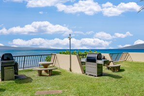 Enjoy al fresco dining with a grill station and seating for two on this oceanfront patio.