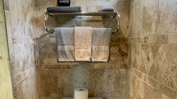 Shower, hair dryer, towels, soap