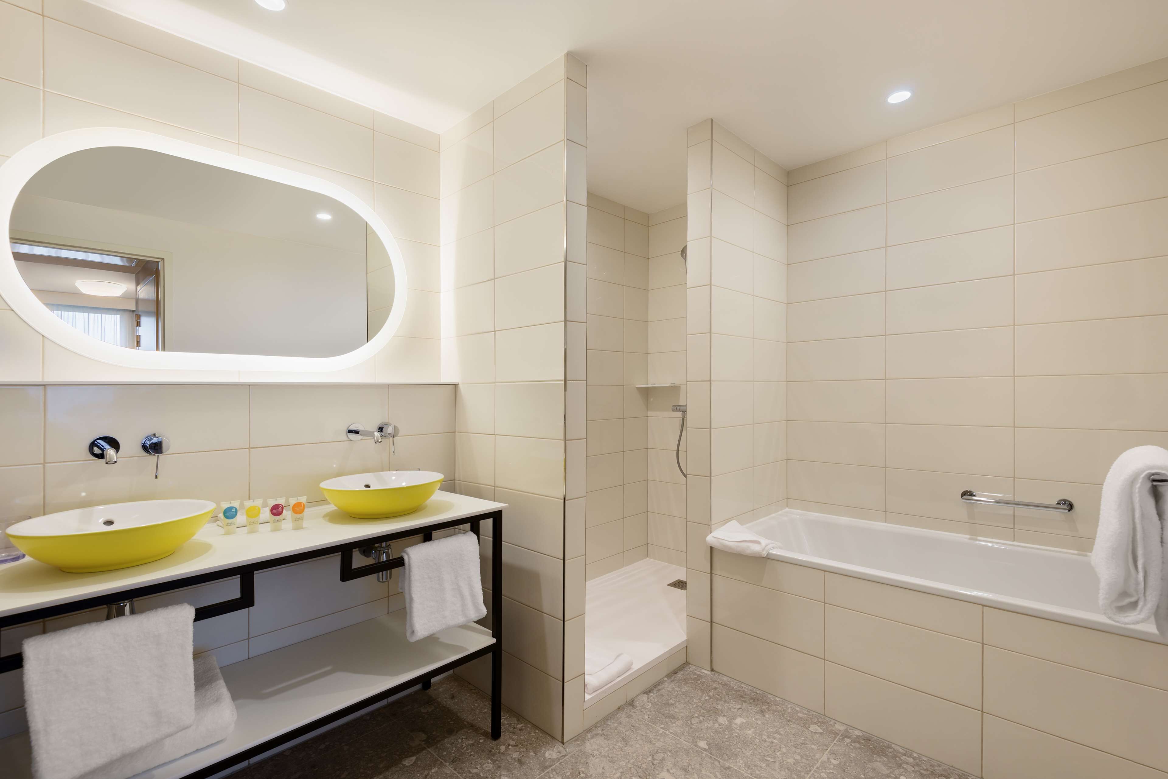 suite, 1 king bed | bathroom | rainfall showerhead, free toiletries, hair dryer, towels