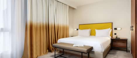 Suite, 1 King Bed | In-room safe, desk, laptop workspace, blackout curtains