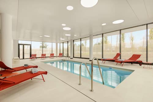 Indoor pool, open 6:00 AM to 10:00 PM, sun loungers