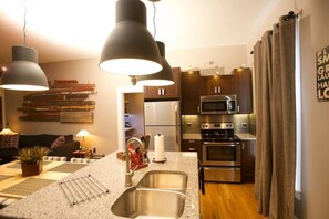 Fridge, microwave, oven, stovetop - Vetehuset-Plantera+Skorda: Loft "Two Apts in One" (Lindsborg)