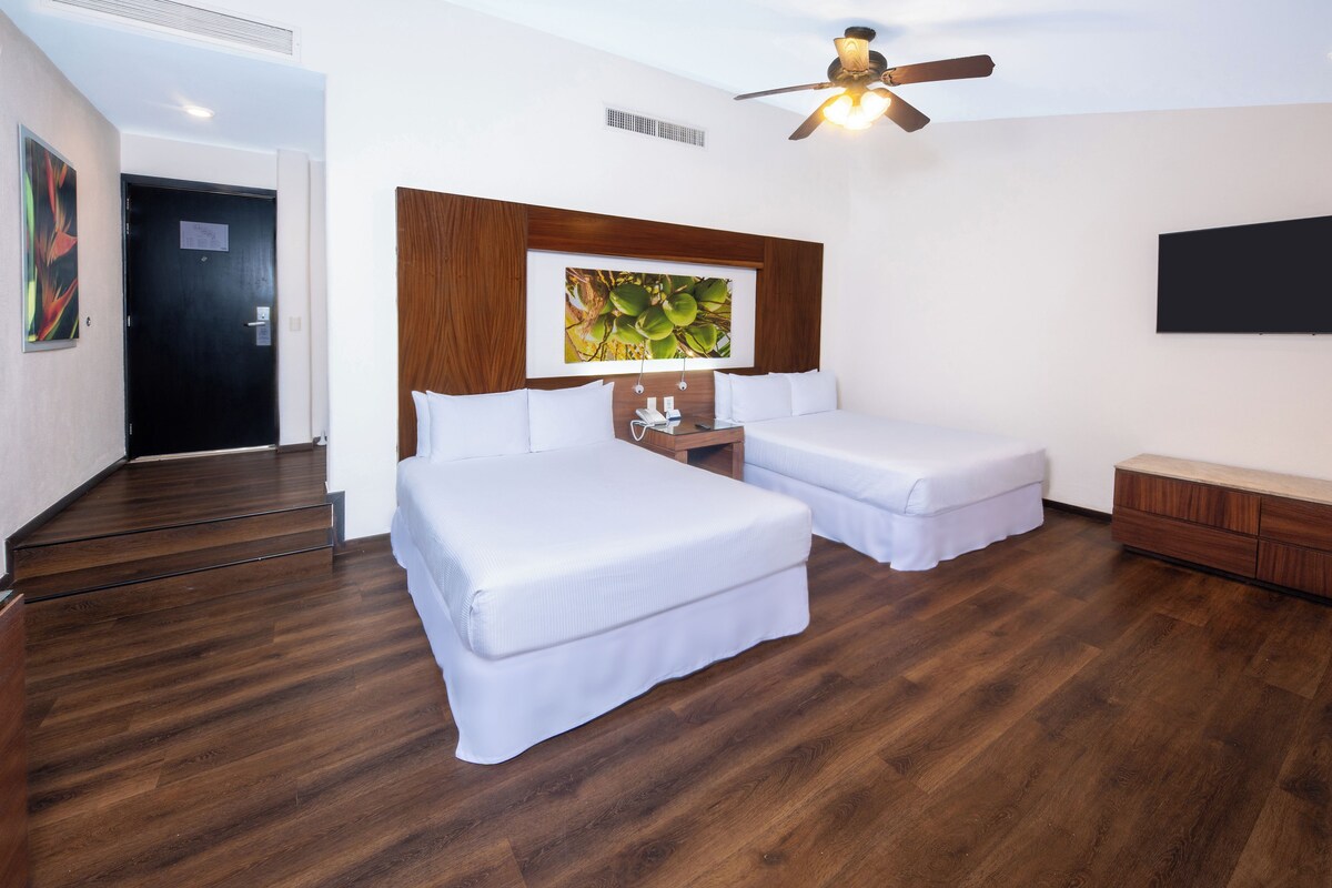 Luxury Room, 2 Double Beds, Partial Ocean View | Free minibar, in-room safe, blackout curtains, iron/ironing board