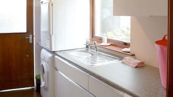 Microwave, dishwasher, toaster, dining tables