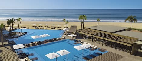 3 outdoor pools, pool umbrellas