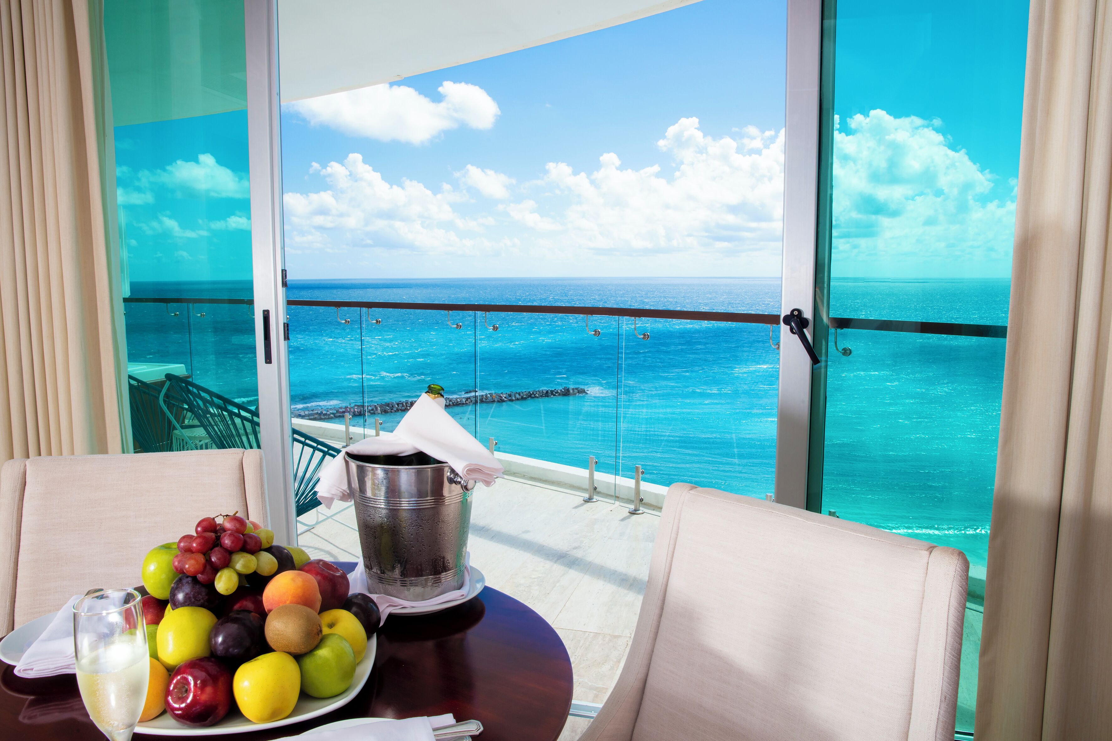 Altitude Master Suite, Ocean front | Living area | 50-inch LED TV with cable channels, TV