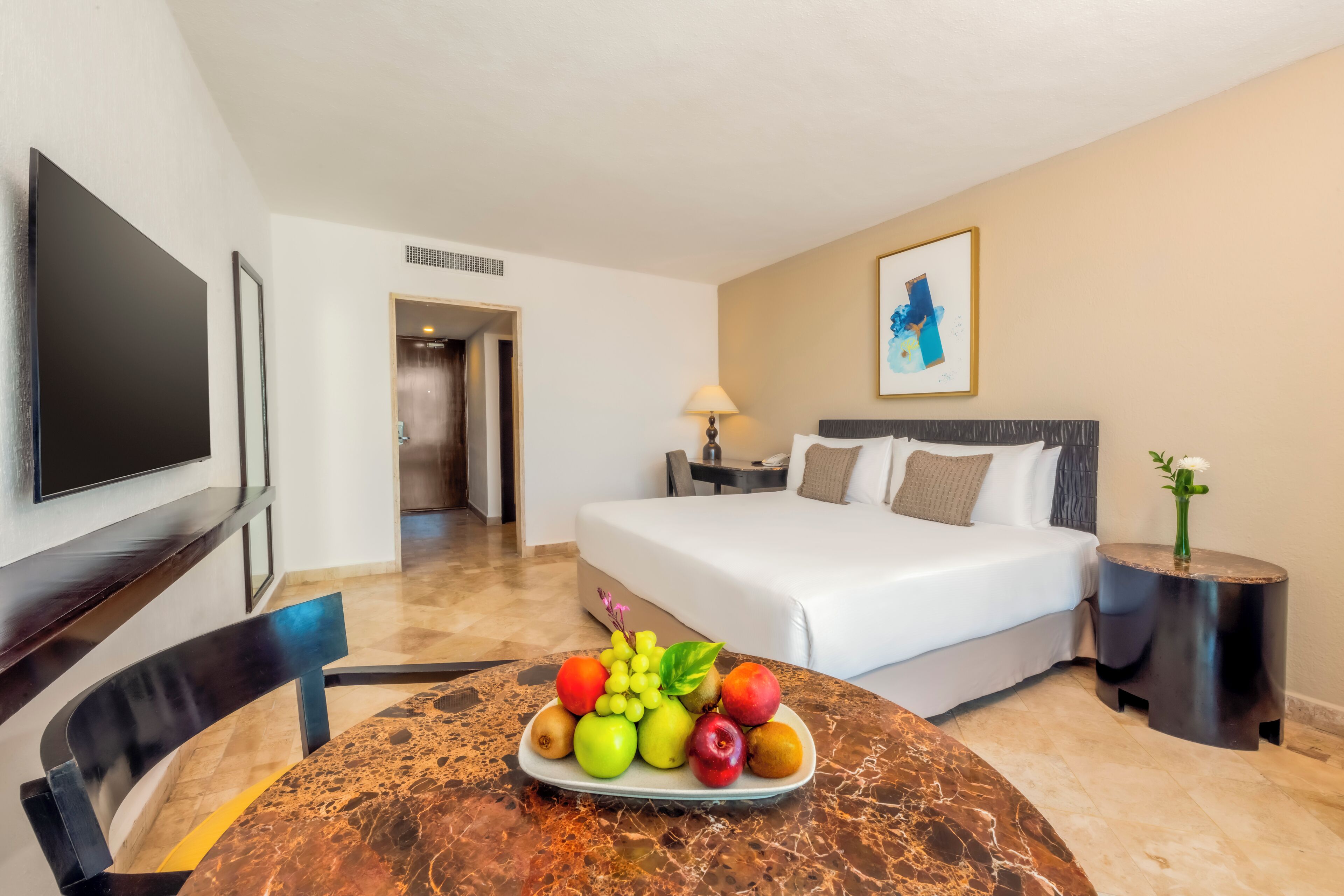 Premium bedding, down comforters, pillowtop beds, in-room safe