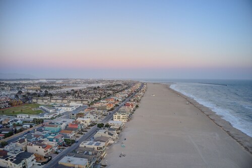 Steps to Sand. Steps to Harbor. Endless Memories<br>4-bedroom, 3-bath retreat comfortably sleeps up to 8 guests, making it ideal for families, couples, or friends seeking a coastal getaway.