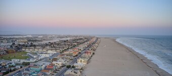 Steps to Sand. Steps to Harbor. Endless Memories<br>4-bedroom, 3-bath retreat comfortably sleeps up to 8 guests, making it ideal for families, couples, or friends seeking a coastal getaway.