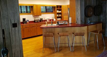 Awesome Lake House with Natural Beach, Huge Dock, and Sunset Views. Sleeps 9