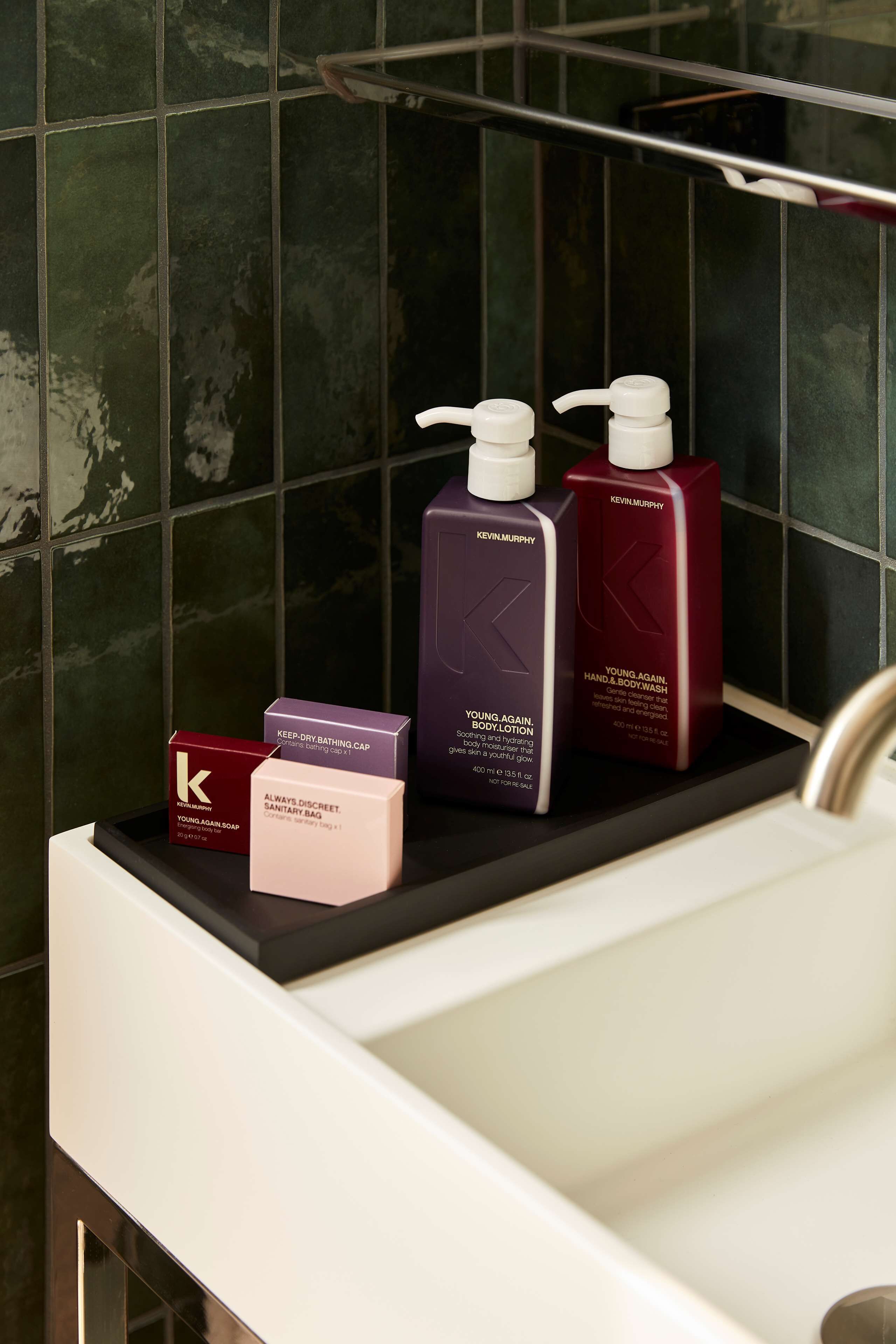 designer toiletries, hair dryer, towels, soap