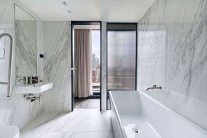 Designer toiletries, hair dryer, towels, soap