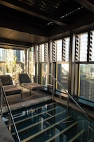 Indoor pool, sun loungers