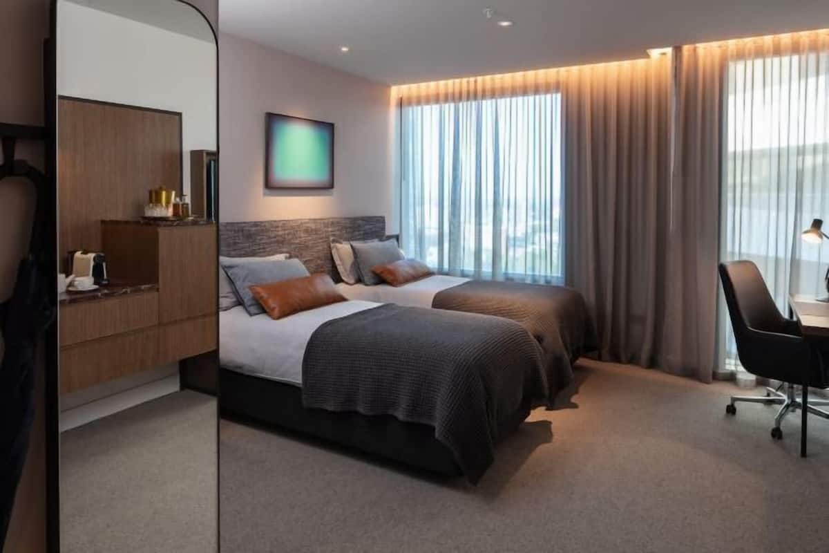 Premium bedding, pillowtop beds, minibar, in-room safe