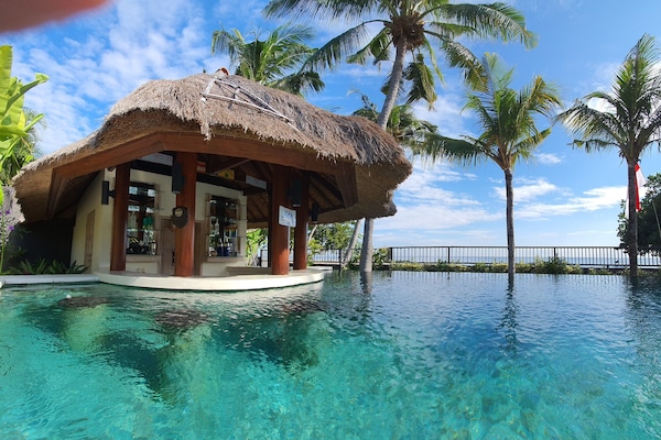 Outdoor pool, open 8:00 AM to 7:00 PM, pool umbrellas, pool loungers
