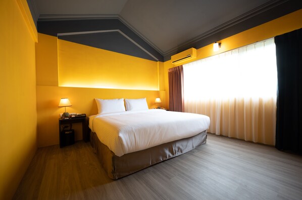 Pillowtop beds, free minibar, laptop workspace, blackout drapes