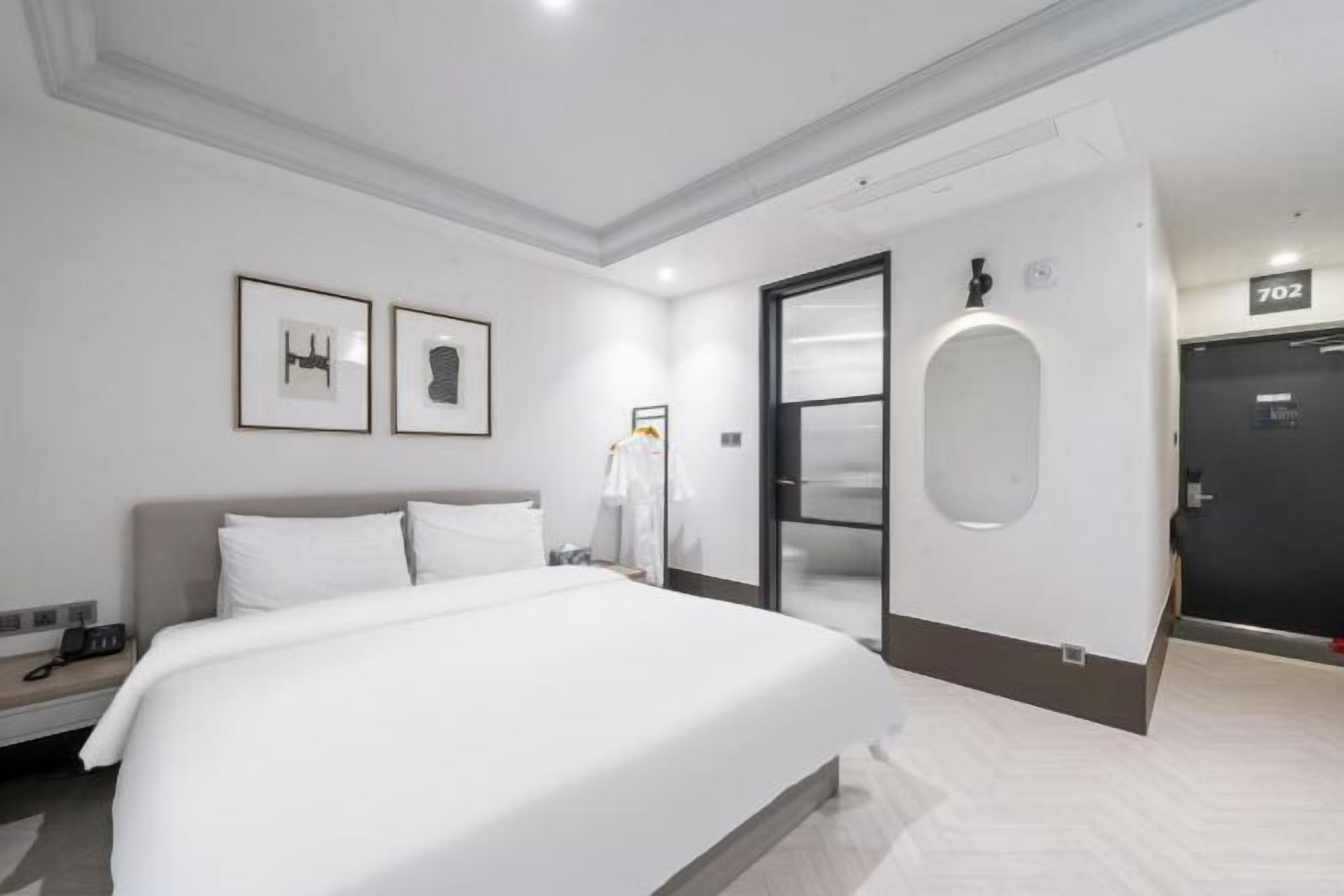 Sengetøy av topp kvalitet, dundyner og individuelt dekorert