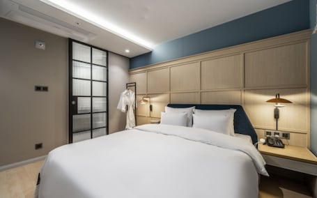 Premium bedding, down comforters, individually decorated