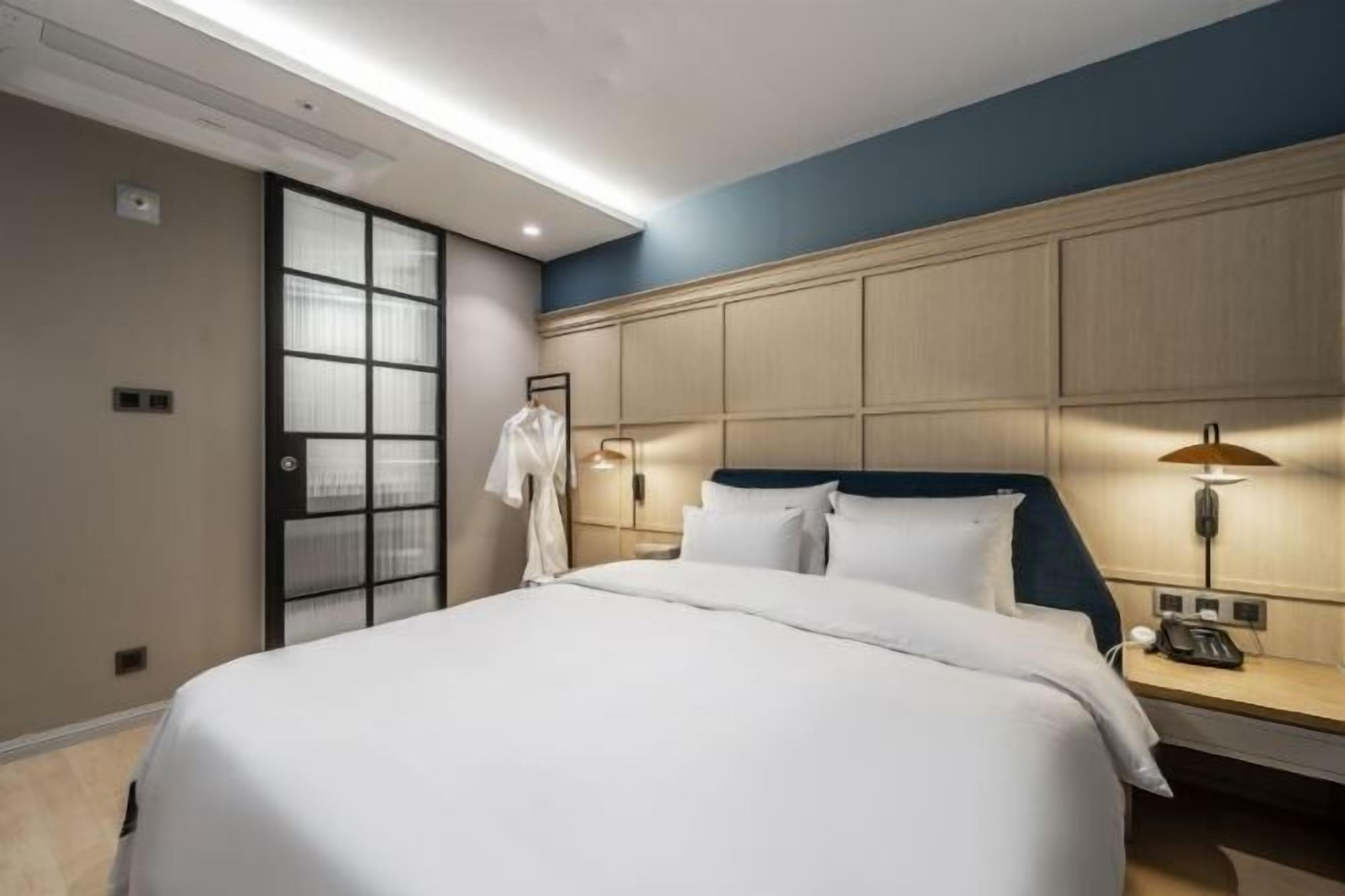 Premium bedding, down duvets, individually decorated