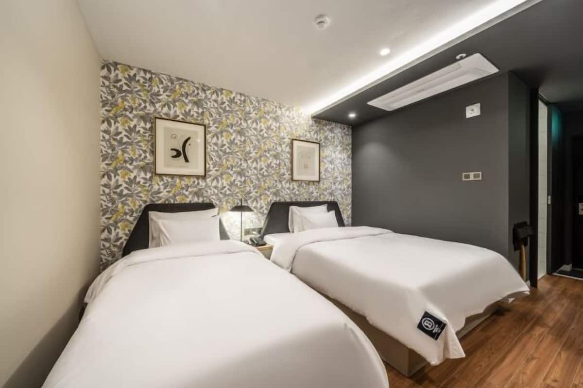 Premium bedding, down comforters, individually decorated