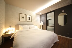 Premium bedding, down duvets, individually decorated