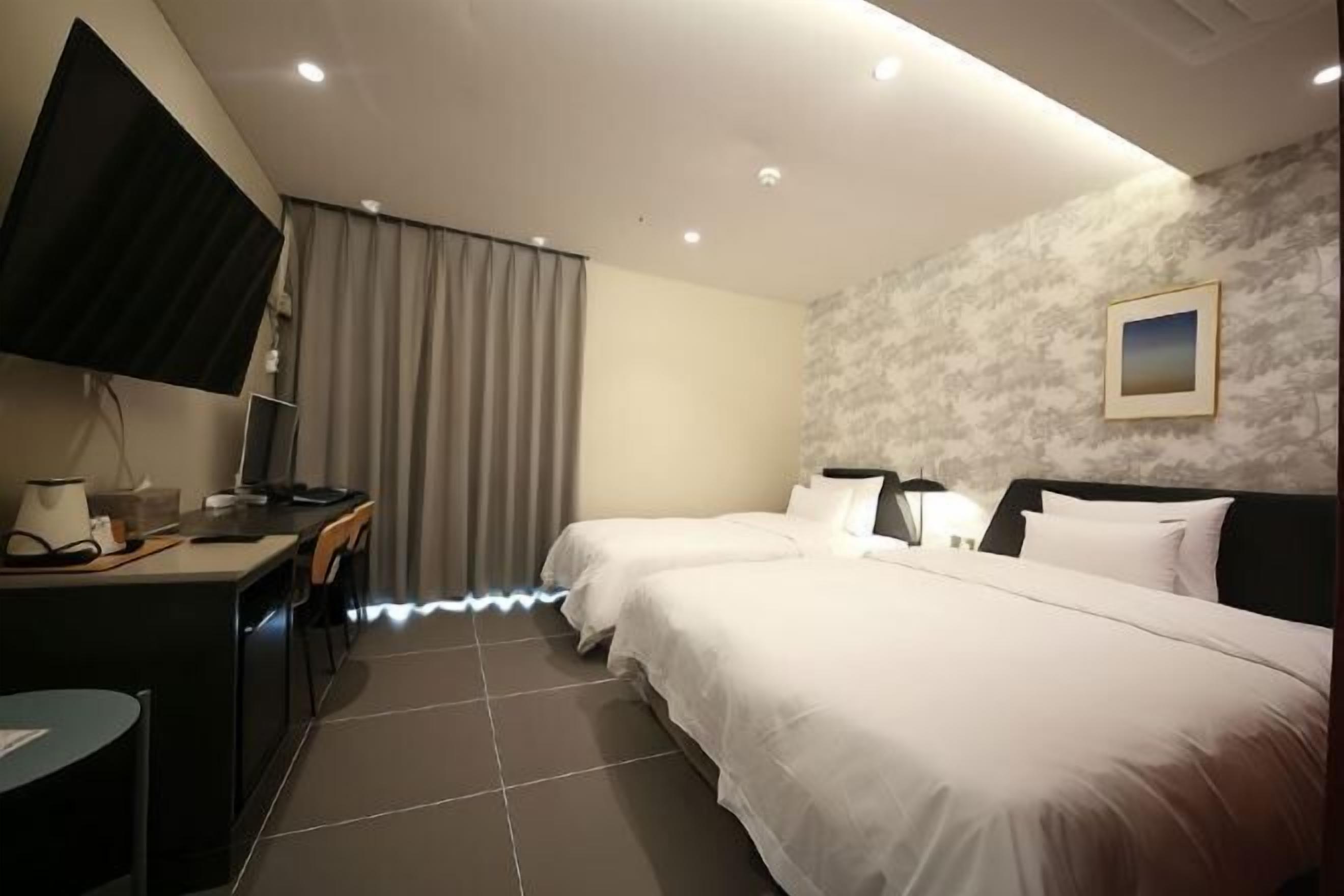 Premium bedding, down duvets, individually decorated