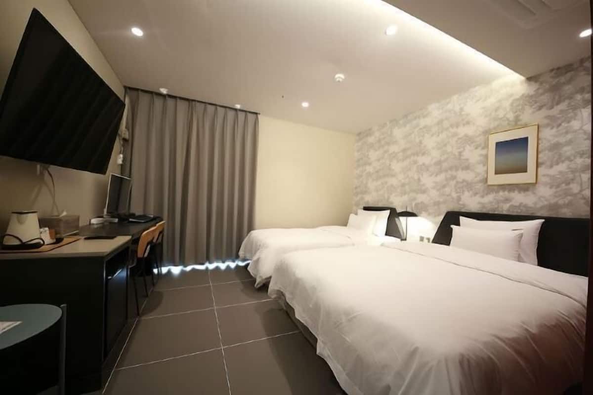 Premium bedding, down comforters, individually decorated