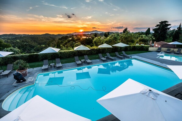 Outdoor pool, pool umbrellas, pool loungers