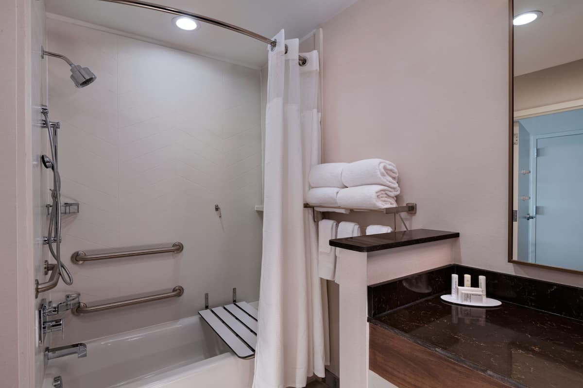 Room, 2 Queen Beds (Mobility Accessible, Tub) | Down comforters, in-room safe, blackout drapes, iron/ironing board