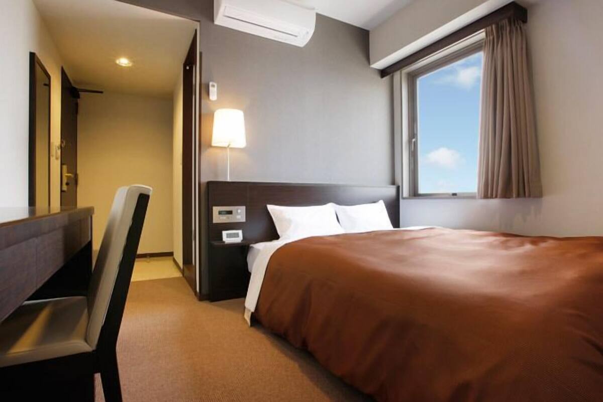 Desk, blackout curtains, iron/ironing board (on request), free WiFi