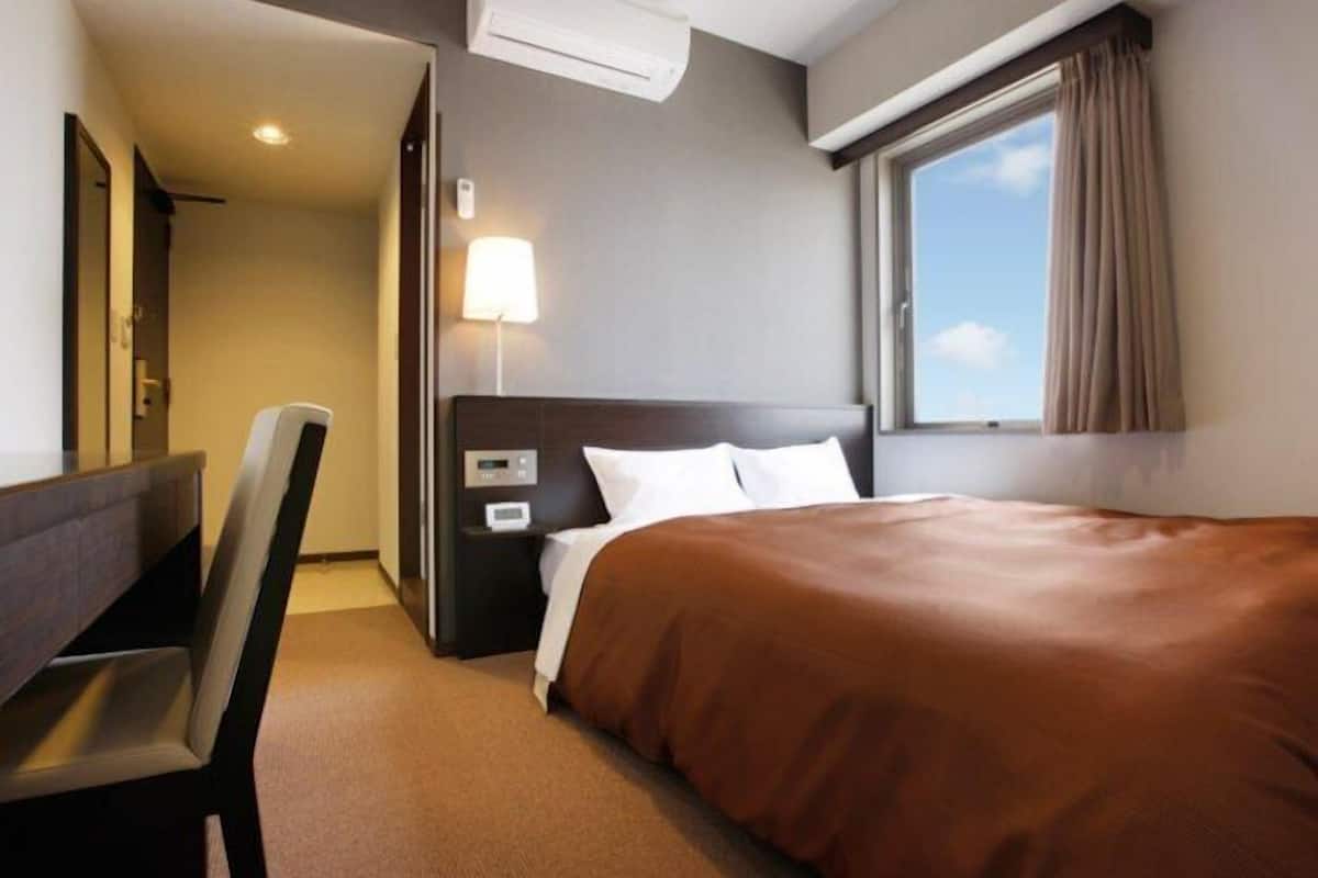 Desk, blackout curtains, iron/ironing board (on request), free WiFi