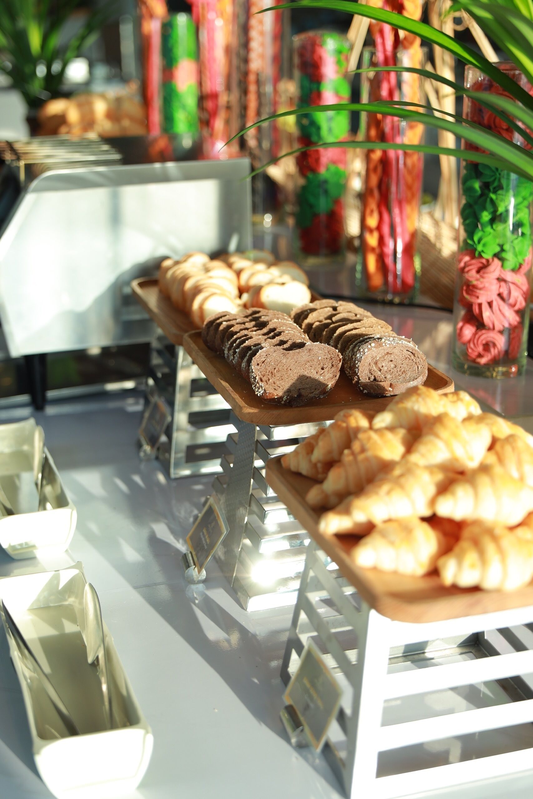 A bakery display with various baked goods.