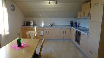 Apartment | Private kitchen | Fridge, microwave, stovetop, coffee/tea maker